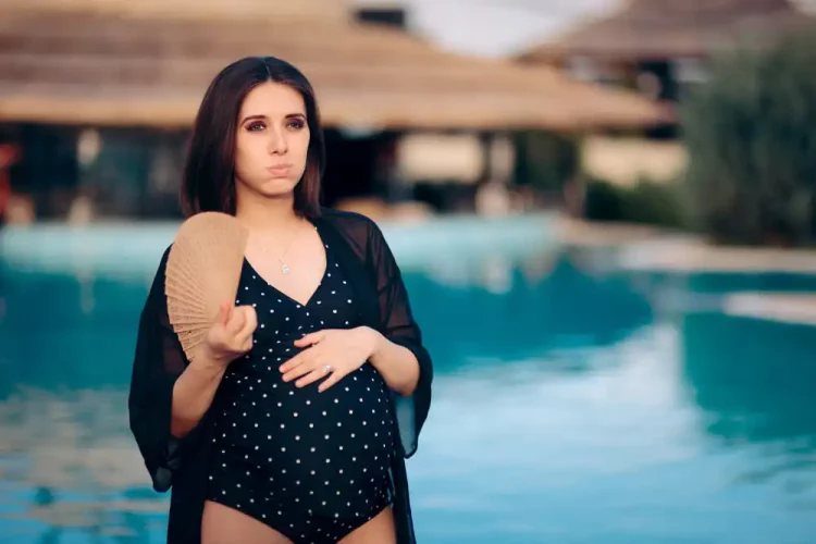 pregnant woman in bathing suit